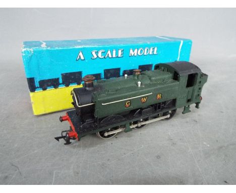 Graham Farish - A boxed 00 gauge pannier tank engine operating number 9410 in GWR livery. The loco appears Very Good with lig