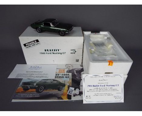 Danbury Mint - A boxed Danbury Mint 1:24 scale 'Bullitt' 1968 Ford Mustang GT. The model in green appears to be in Mint condi