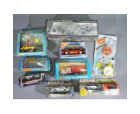 Matchbox, Tonka, Corgi  - A boxed group of diecast and tinplate model vehicles. Lot includes Matchbox K79 Plymouth GF Taxi; M