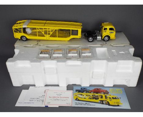 Danbury Mint - A boxed Danbury Mint 1:24 scale 1952 White Car Transporter. This large and impressive model in yellow appears 