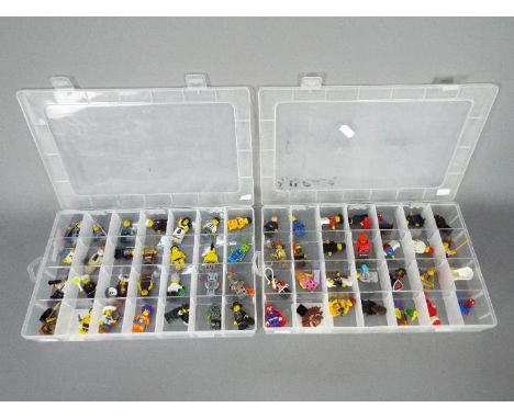 Lego - A collection of 56 x Lego figures including a robot, a cowgirl, a sumo wrestler and similar. They appear in Good condi
