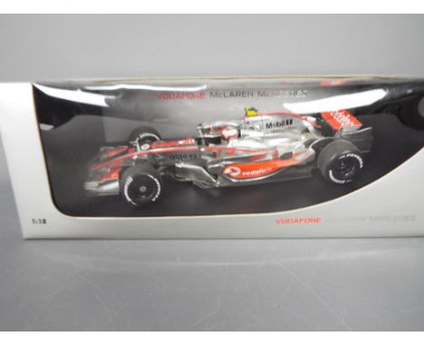 Minichamps - A boxed 1:18 scale Minichamps #503081823 Vodafone McLaren Mercedes MP4-23 2008 'H.Kovalaainen' Formula 1 Racing 