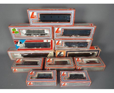 Lima - 12 boxed items of OO gauge freight rolling stock by Lima. Lot includes Lima #305360W Parcels Van; #305620W BR Standrad