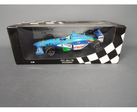 Minichamps - A boxed Limited Edition 1:18 scale Benetton Formula 1 1999 Showcar 'G.Fisichella'. The model appears Mint in a G