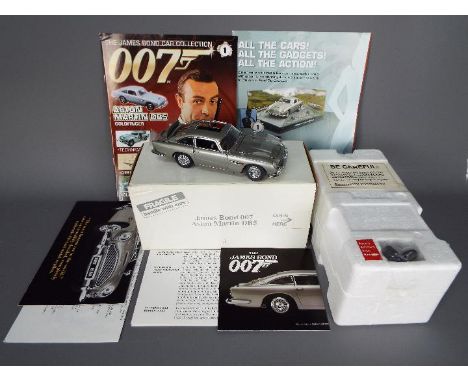 Danbury Mint - A boxed Danbury Mint 1:24 scale James Bond 007 Aston Martin DB5. This iconic and highly detailed model appears