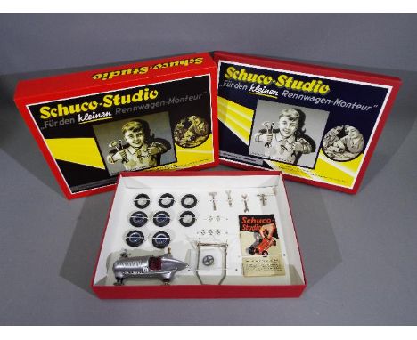 Schuco - A boxed Schuco Studio tinplate Mercedes racing car set with tools to fit and change the wheels. # 01019. The model a