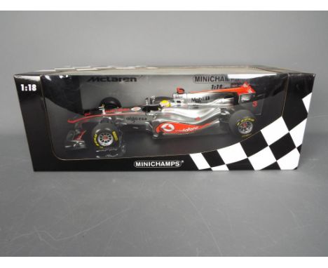 Minichamps - A boxed Minichamps #530111873 Limited Edition 1:18 scale Vodafone McLaren Mercedes Showcar 2011 'Lewis Hamilton'