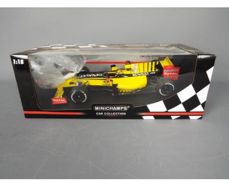 Minichamps - A boxed 1:18 scale Minichamps #150100081 Renault F1 Team Showcar 2010 'R.Kubica'. The model appears Very Good du