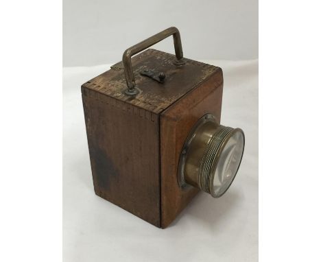 A WOODEN MINING INSPECTION LAMP WITH BRASS FITTING - WORKING AT TIME OF CATALOGUING 