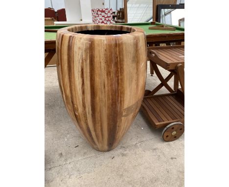 A LARGE MODERN FIBRE GLASS PLANTER (A/F) 
