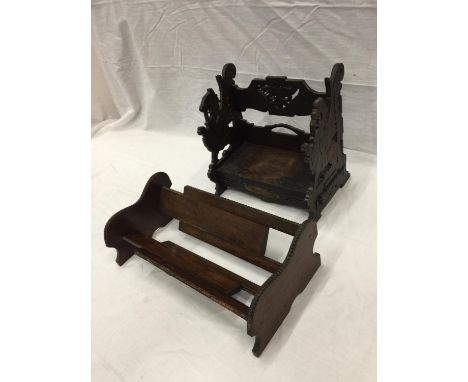 A VINTAGE WOODEN BOOK CASE WITH DRAGON DESIGN AND A FURTHER OAK EXTENDING BOOK TROUGH 