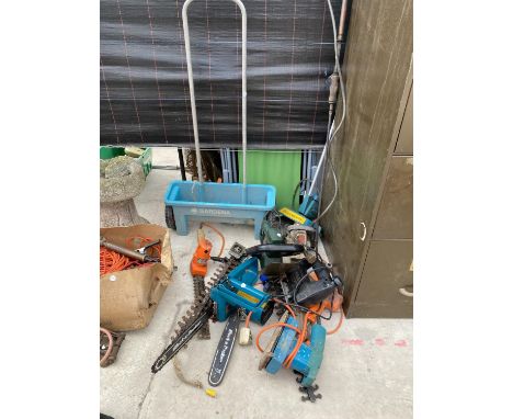 A LARGE ASSORTMENT OF TOOLS TO INCLUDE A GARDEN SEEDER, HEDGE TRIMMERS AND JIG SAWS ETC 