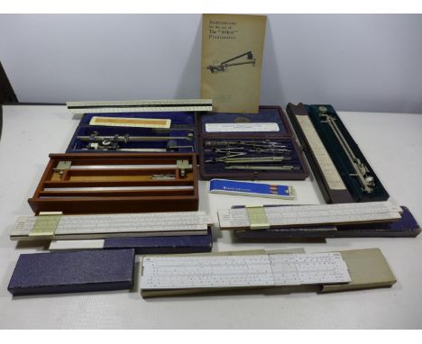 A COLLECTION OF NAVAL ARCHITECTS DRAWING INSTRUMENTS, TO INCLUDE A PLANIMETER, RULERS, SLIDE RULES, LOCKIES DRAWING SCALES ET