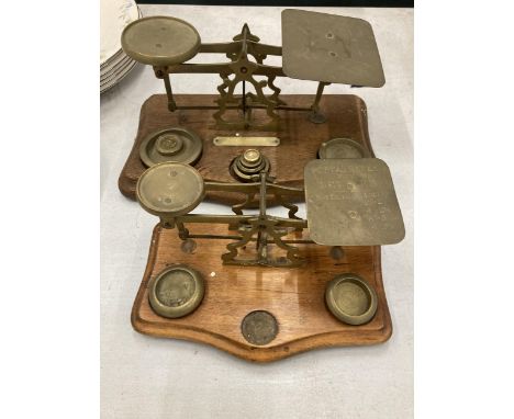 TWO SETS OF WOOD AND BRASS POSTAL SCALES WITH WEIGHTS 