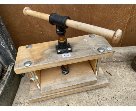 A WOODEN MANUAL BOOK PRESS 