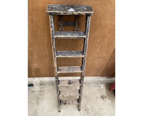 A PAIR OF VINTAGE MINITURE WOODEN STEP LADDERS 
