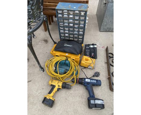 AN ASSORTMENT OF TOOLS TO INCLUDE TWO BATTERY DRILLS AND AN ELECTRIC WOOD PLANE ETC 