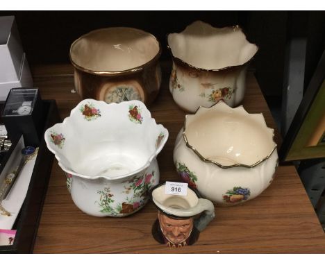 FOUR CERAMIC PLANTERS PLUS A ROYAL DOULTON KING HENRY V111 TOBY JUG 