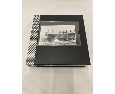 AN ALBUM CONTAINING 200 VINTAGE STEAM ENGINE PHOTOS 
