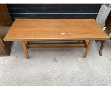 A RETRO TEAK COFFEE TABLE WITH MAGAZINE SHELF, 42X16" 