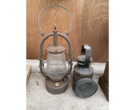 A VINTAGE ROAD LAMP AND A VINTAGE PARAFIN LAMP 