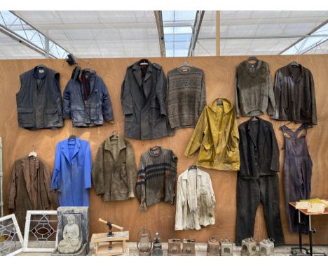 A RARE COLLECTION OF FRED DIBNAH MBE CLOTHING TO INCLUDE BIB AND BRACES, JACKETS AND FURTHER WORK CLOTHES, EACH ITEM OF CLOTH