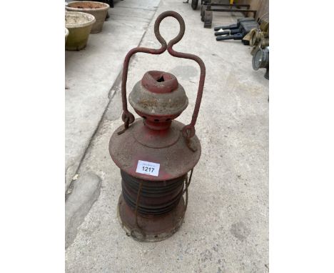 A VINTAGE PARAFIN LAMP 