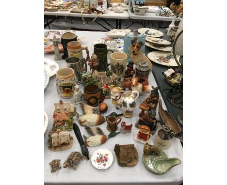 A QUANTITY OF COLLECTABLE ITEMS TO INCLUDE LILLIPUT LANE COTTAGES, WADE ITEMS, GOEBEL FIGURE, DOGS, TANKARDS, ETC 