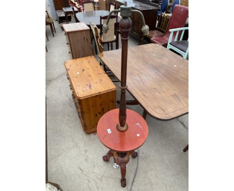 A 20TH CENTURY MAHOGANY STANDARD LAMP/TABLE ON TRIPOD BASE WITH PAW FEET 