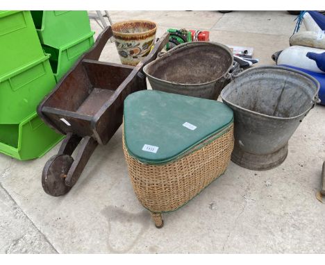 TWO GALVANISED COAL BUCKETS, A WOODEN WHEEL BARROW PLANTER AND A SEWING BASKET 