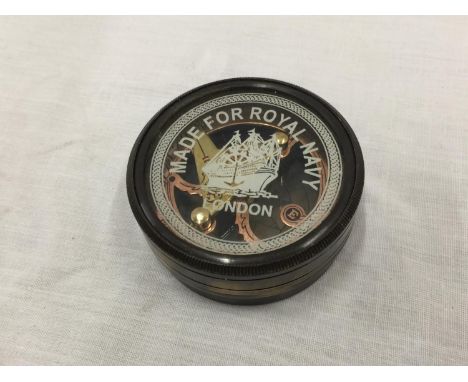 A BRASS ROYAL NAVY SUNDIAL COMPASS IN A CASE W: 7CM 