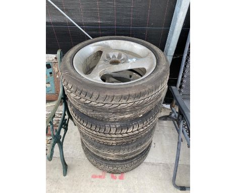 FOUR TEN STUD CAR WHEELS WITH DUNLOP 215/50R17 TYRES 