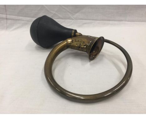 A WORKING BRASS TAXI HORN 