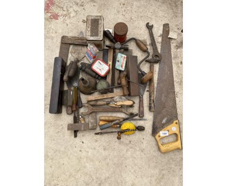 AN ASSORTMENT OF TOOLS TO INCLUDE HAMMERS, SPANNERS AND SHARPENING STONES ETC 