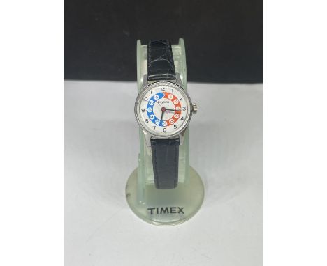 A TIMEX WRIST WATCH SEEN WORKING BUT NO WARRANTY 