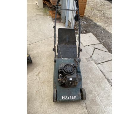 A HAYTER PETROL ENGINE LAWN MOWER WITH GRASS BOX 