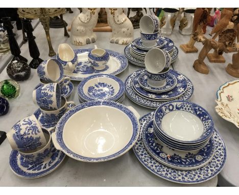 A QUANTITY OF EMPIRE 'OLD WILLOW' PATTERN TO INCLUDE CUPS, SAUCERS, BOWLS, SERVING PLATE SAUCE JUGS, PLUS A JOHNSON BROS. BLU