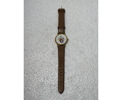 A VINTAGE MICKEY MOUSE WATCH IN A BOX 