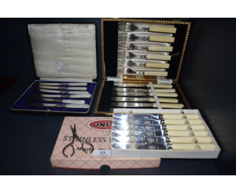 A selection of vintage flat ware including boxed Mother of pearl handled knives and fish servers.