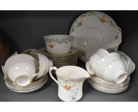 A collection of Crown Chelsea 'Gloria' tea service including cups and saucers,plates and jug.