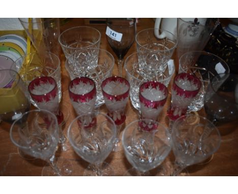 A collection of vintage glass including coloured and etched examples.