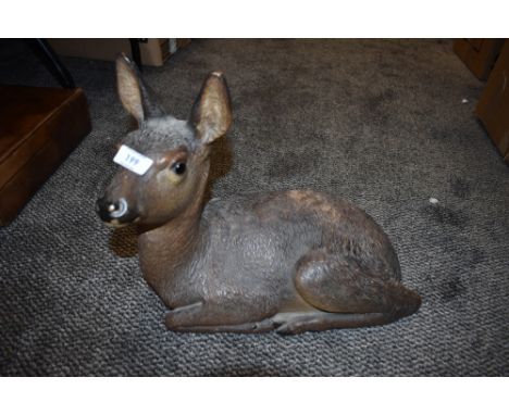 A ceramic decoy Fawn having real life glaze approx 46cm long