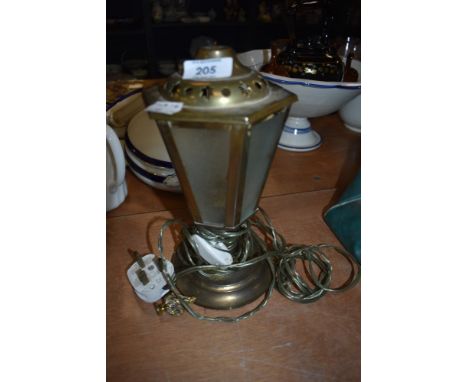 A vintage brass bodied lantern style light