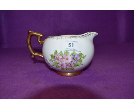 A Hand painted Spode Copeland china jug, signed EE Casson to underside.