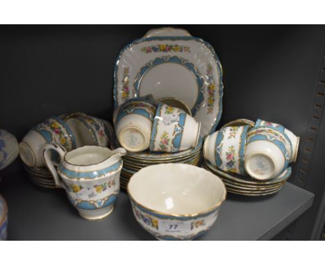 A collection of vintage Crown Staffordshire china having blue edging with floral transfer pattern, included are plates,cups a