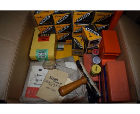 A selection of photographic equipment including as new Cadre titania projector slides.