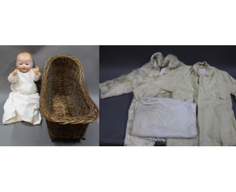 An Armand Marseille bisque head dream baby doll, 351/3 K, having open mouth and two lower teeth, composition body and measuri