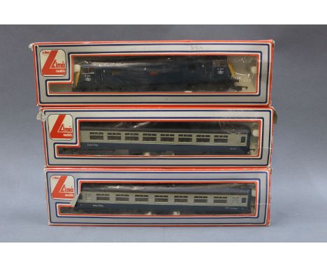 A Lima 00 gauge D814 diesel locomotive together with 2 intercity blue/grey coaches 
