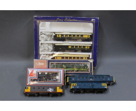 A group lot of Lima 00 gauge locomotives and coaches to include a "The Fife &amp; Forfar Yeomanry" 9006 diesel locomotive 