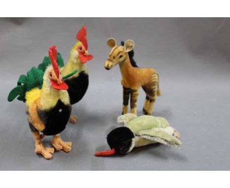A group of 4 1960's Steiff animals, consisting of 2 cockerels, an okapi, and a penguin   